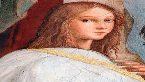 Detalle del fresco «La escuela de Atenas» de Rafael Sanzio que muestra a Hipatia de Alejandría con cabello largo y ondulado, vestida de blanco con una cenefa dorada.